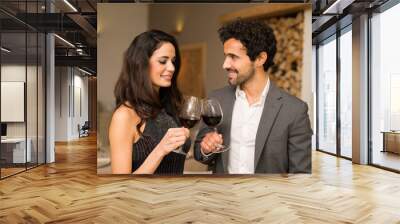 Beautiful couple toasting wineglasses Wall mural