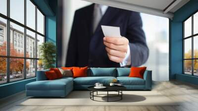 Businessman giving a business card Wall mural