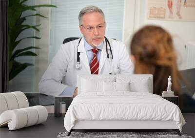 Doctor listening to his patient Wall mural