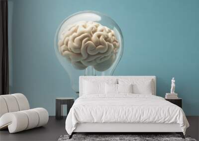 Human brain generating innovative ideas inside light bulb on blue background Wall mural