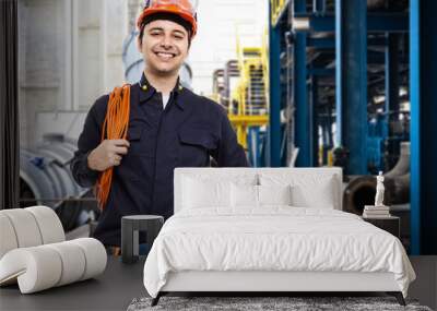 Portrait of a worker in a factory Wall mural