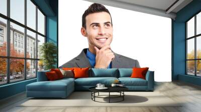 smiling businessman looking up Wall mural