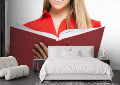 Young woman holding a book Wall mural