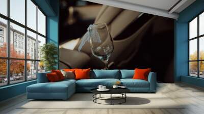 bottle of champagne and glass in luxury car Wall mural