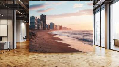 Coastal Florida cityscape with buildings along sandy beach at sunset Wall mural