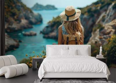 A woman holds a message that speaks of the allure of travel and the yearning for adventure. Wall mural