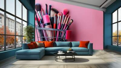 A shopping cart trolley full of makeup products isolated against a pink background. For the design of cosmetic advertising banners, flyers or posters with copy space to add text. Wall mural