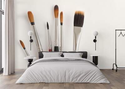 artist paint brushes in minimal style on empty background and simple look Wall mural