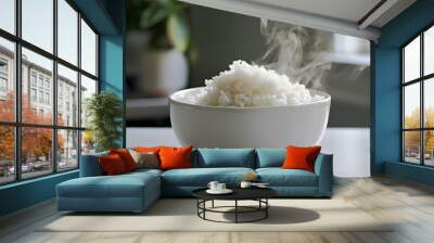 A bowl of freshly steamed rice with a fluffy texture. Wall mural