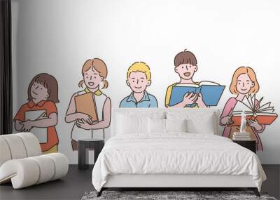 Cute children holding books and reading. hand drawn style vector design illustrations.  Wall mural