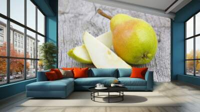 Fresh pear on old wooden background Wall mural