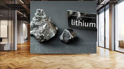 Raw lithium samples on a dark surface, highlighting the future of sustainable energy sources Wall mural