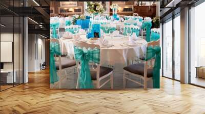 Luxury table setting with cutlery, wineglasses and floral arrangement on table, copy space. Place setting at wedding reception. Table served for wedding banquet in restaurant Wall mural