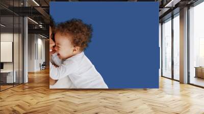 Love of a mother and baby. Family at home. Lifestyle Wall mural