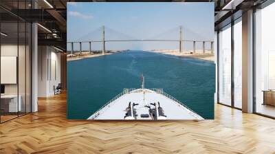 Cruise ship passengers passing through Suez Canal. Wall mural