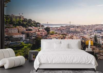 Panoramic image of the city of Lisbon, Portugal. Some buildings in the center of the city, the castle of San Jorge and the famous bridge of April 25 in the background above the Tejo river. Wall mural