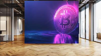 Image of a bitcoin illuminated by a pink spotlight on a dark blue background. The reflection of the bitcoin is visible on the shiny floor. Strengthening and growth of cryptocurrency.  Wall mural