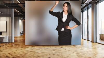 Woman drawing a marker in the empty space Wall mural