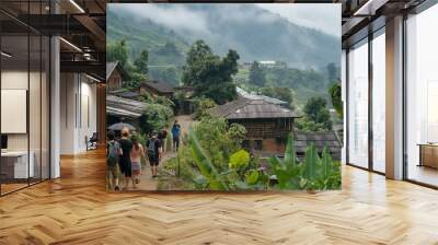 A group of international tourists visiting a local village nestled Wall mural