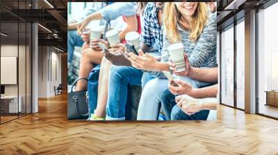 Millenial friends group using smartphone with coffee at university college - People hands addicted by mobile smart phone - Technology concept with always connected trendy millennials - Filter image Wall mural