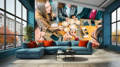 Top view of happy friends toasting cappuccino drink at coffee shop restaurant - Millennial people group having fun on breakfast together at fashion cafe bar - Friendship concept on vivid warm filter Wall mural