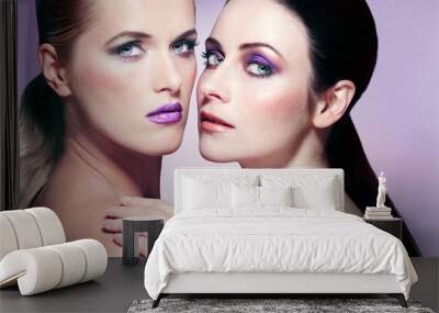 Two attractive young women with beautiful makeup. Wall mural