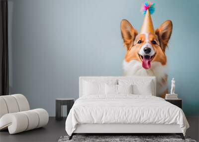 Happy Corgi dog with birthday party hat isolated on blue pastel background, copy space for text, digital art, ai generated Wall mural