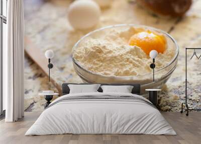 Bowl of flour with eggs and bread Wall mural