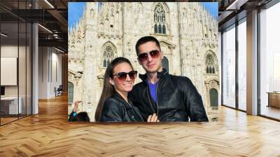 couple in leather in a front of Duomo di Milano - Milan Cathedral - Italy Wall mural