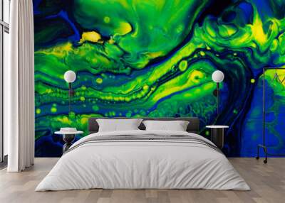 Fluid art texture. Backdrop with abstract mixing paint effect. Liquid acrylic artwork with flows and splashes. Mixed paints for baner or wallpaper. Green, blue and yellow overflowing colors Wall mural