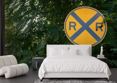 Round Street sign symbol with X and two R's yellow gold and black Wall mural