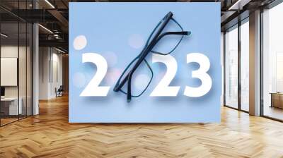 happy new year 2023. 2023 with glasses on  isolated background
 Wall mural