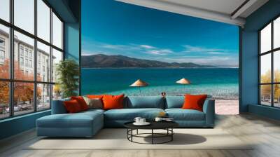 Couple in love in the Blue lagoon. Lovers on the coast. Boy and girl in Turkey. Couple on beach. Man and woman on the island. Couple on vacation. Honeymoon trip. Couple on the lake. Wedding travel Wall mural