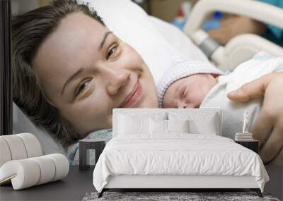 Happy mother with newborn baby Wall mural