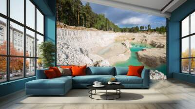 Open pit quarry ore white kaoline mining with blue sky and water Wall mural