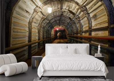 Underground emerald ore mine shaft tunnel gallery passage with light Wall mural