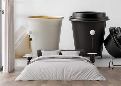 Two paper coffee cups, one white and one black, with lids, on a stark white background, ideal for advertising. Wall mural