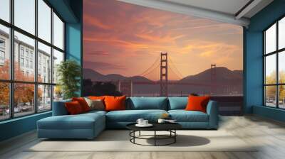 Golden Gate bridge in background of San Francisco mountains during sunset. Majestic structure over Pacific Ocean. Architectural landmark in California, USA. Iconic bridge with suspension design. Wall mural