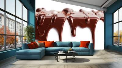 Rich brown chocolate flows in liquid form on a clean white background. Melted cocoa droplets create a sweet and delicious dessert image. Chocolate candy confectionery product. Wall mural