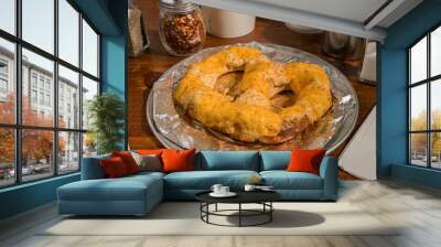 Soft pretzel with crab dip and cheese Wall mural