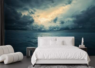 Dramatic Ocean Seascape with Dark Clouds and Glowing Sky Wall mural