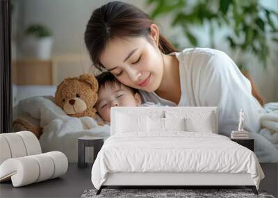 Mother and Baby Sleeping Peacefully with Teddy Bear Wall mural