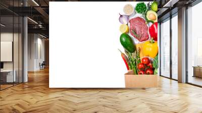 Healthy food background. Healthy food in paper bag meat beef, fruits, vegetables and pasta on white background. Shopping food supermarket concept. Long format with copy space Wall mural