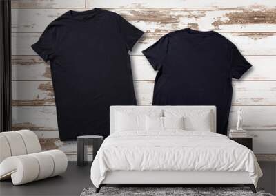 Mockup of blank black tshirt front and rear on white wooden background. Shirt design for man. Flat lay, top view. Wall mural