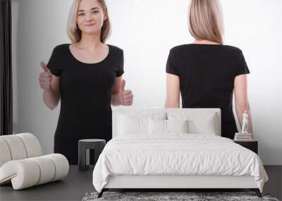 Shirt design and people concept - close up of young woman in blank black tshirt front and rear isolated. Mock up template for design print Wall mural