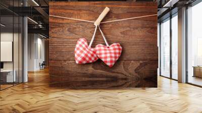 Two hearts and wooden background. Wall mural