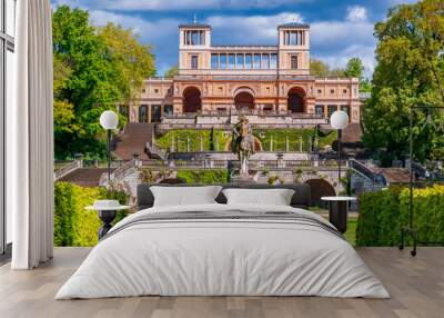 Frederick the Great monument with Orangery at background in Sanssouci park, Potsdam, Germany Wall mural