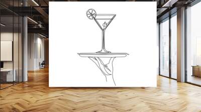 Continuous line vector illustration of hand holding dish with glass with martini drawn from the hand a picture of the silhouette. Line art.  Wall mural