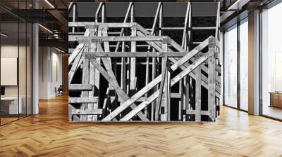 Wood framing of  a new house under construction in abstract form in the Southwest part of the United States Wall mural