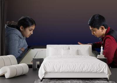 Indian Siblings Playing Carrom on the Carrom Board Wall mural